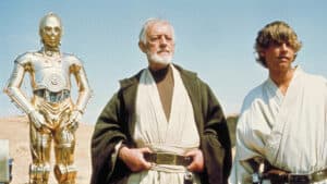 C-3PO, Obi Wan and Luke Skywalker.