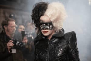Cruella with "the future" written over her face in makeup.
