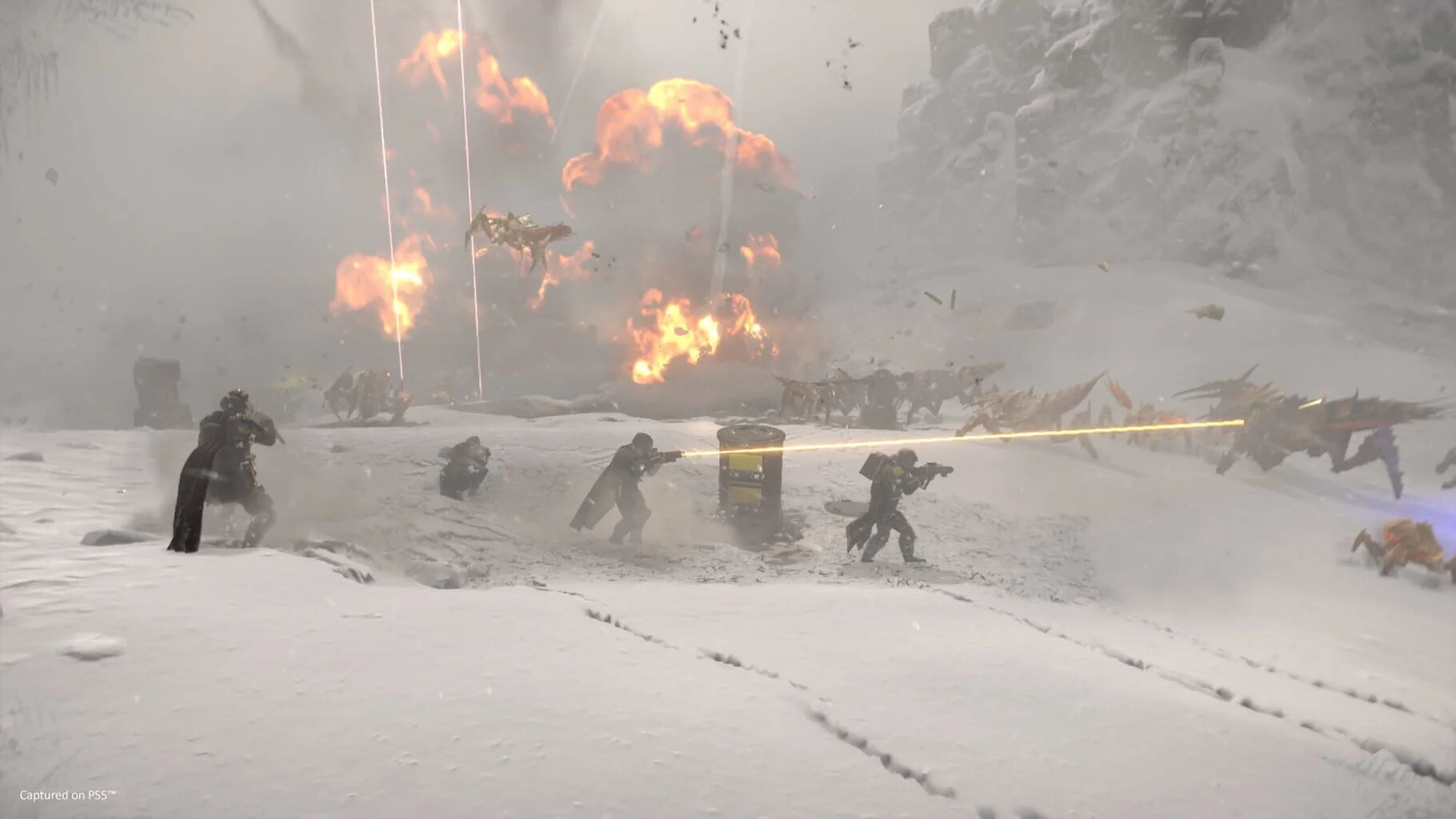 Helldivers squad fighting in ruined cityscape