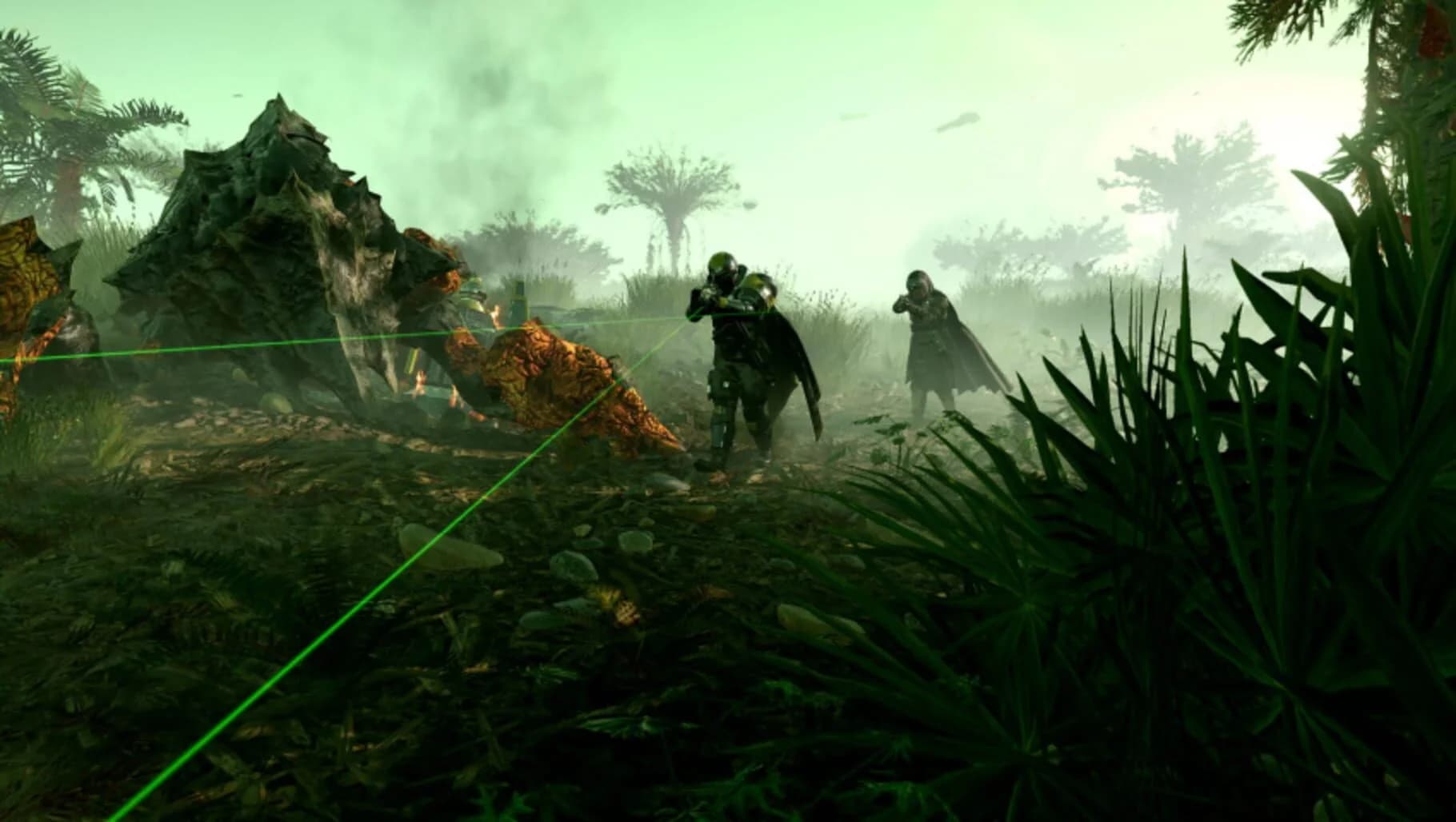 Helldivers II players storming a defensive position with chaos all around