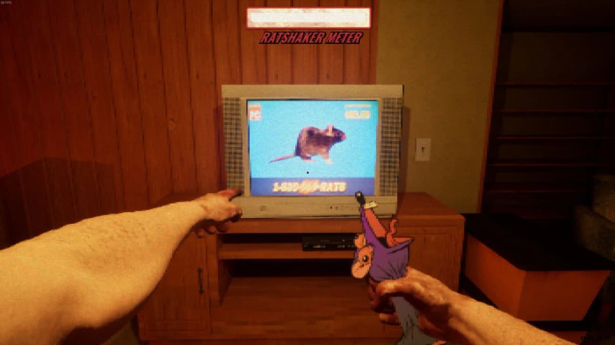 Player navigating a cluttered room with the rat in hand