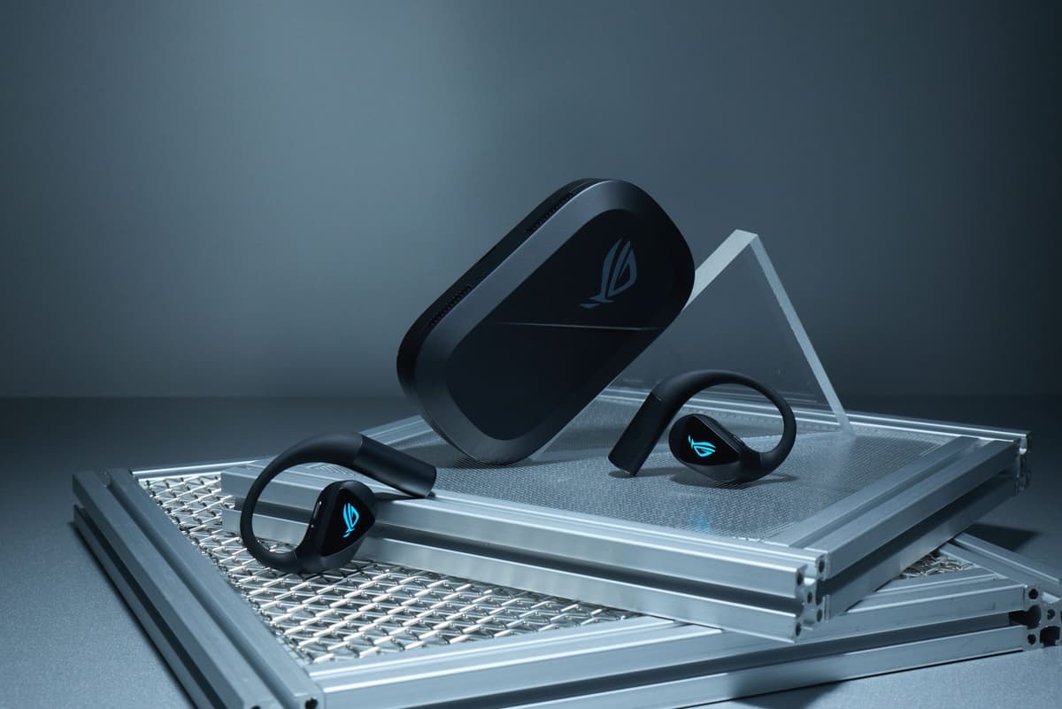 Asus ROG Cetra Open Wireless earbuds worn by a gamer – lifestyle photo