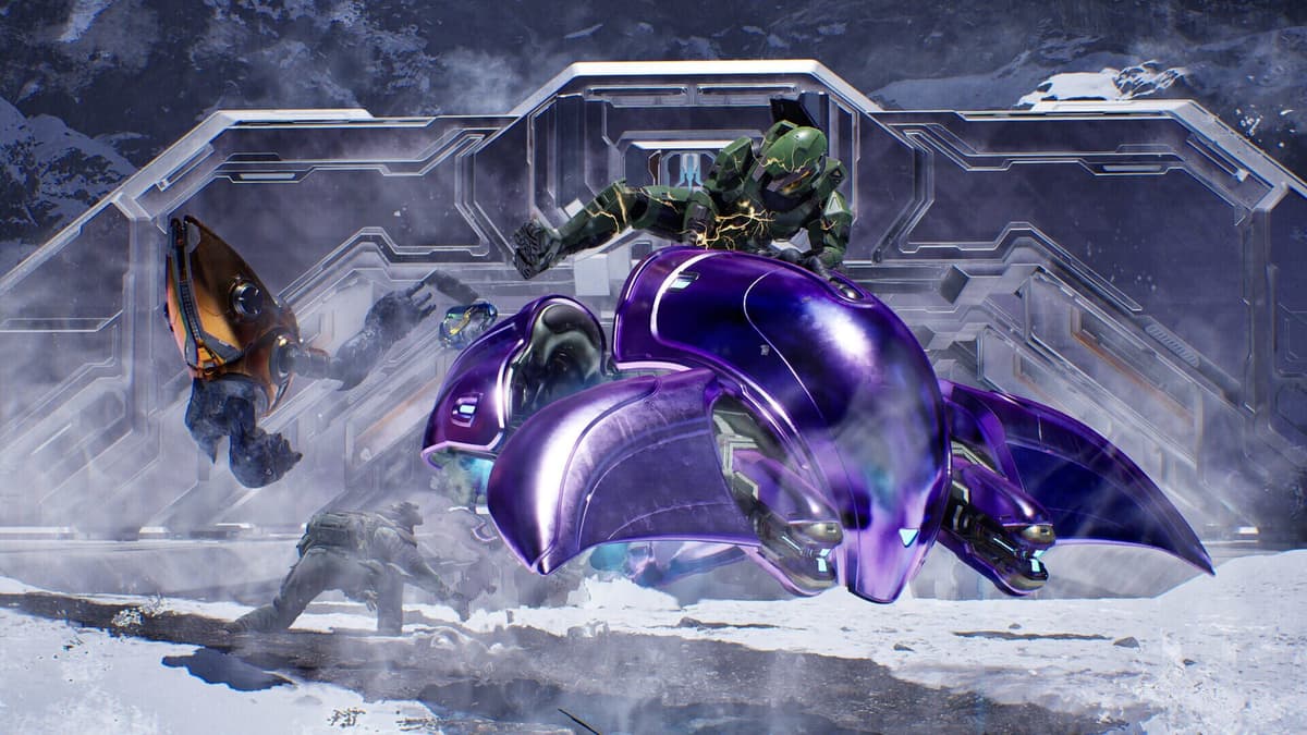 Master Chief beside a Covenant Wraith in Halo: Campaign Evolved.