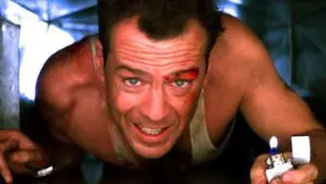 John McClane in an air vent.
