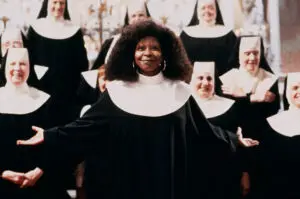 Whoopi Goldberg as Deloris Wilson/Sister Mary Clarence in front of nuns.