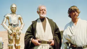 C-3PO, Obi Wan and Luke Skywalker.